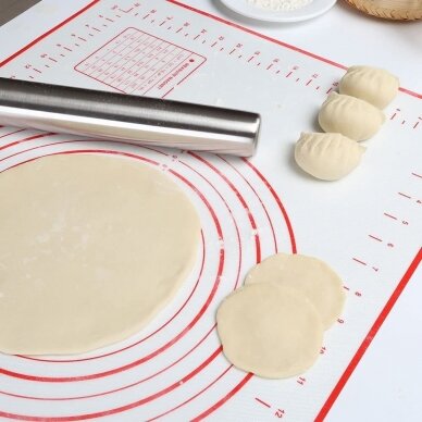 Silicone pastry matThis heat resistant (up to 260 degrees Celsius or 500 degrees fahrenheit) non-stick baking mat is a great helper in the kitchen. The food will not stick to it, so it is very easy to wash it under running water or in the dishwasher. You 2
